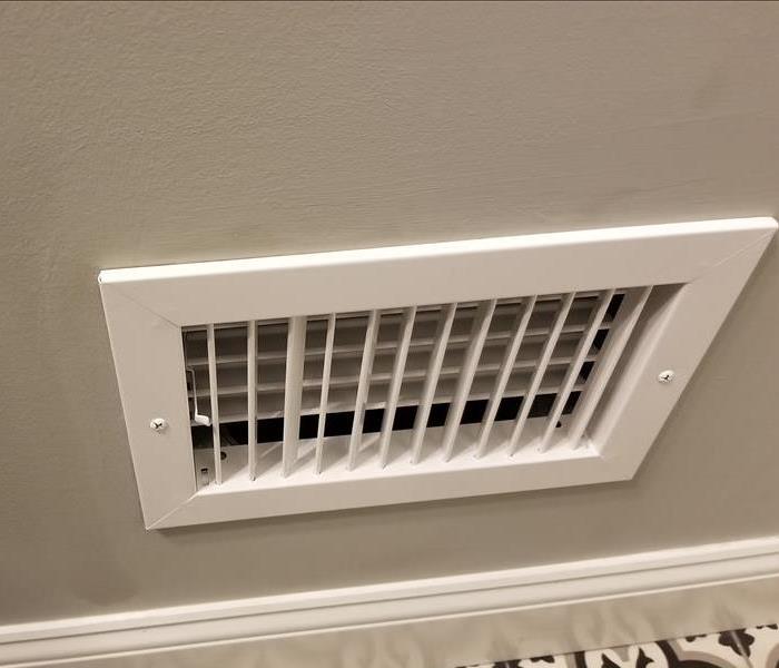 Heating vent with no soot damage.