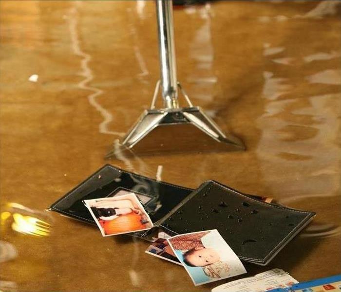 Flooding with wallet, personal pictures and water extraction tool.