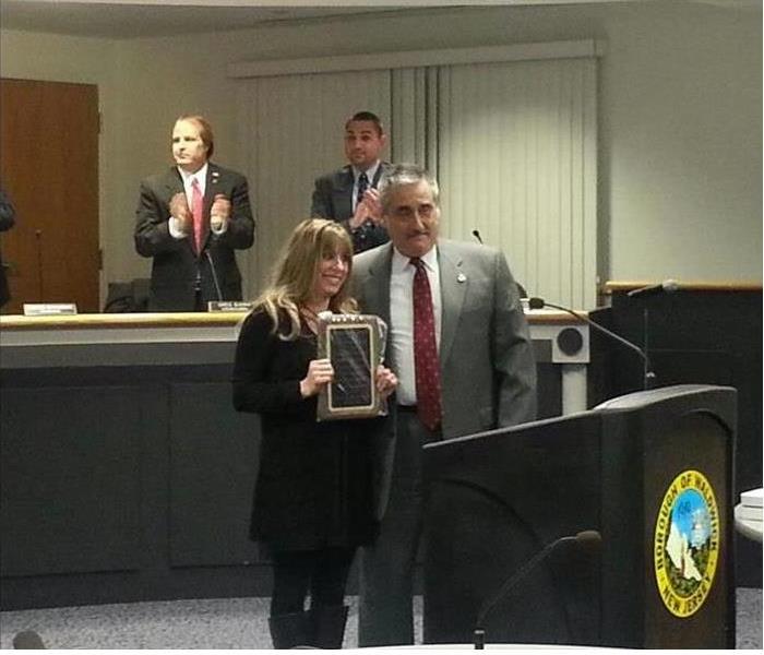 Karen being awarded the Citizen of the year award. 